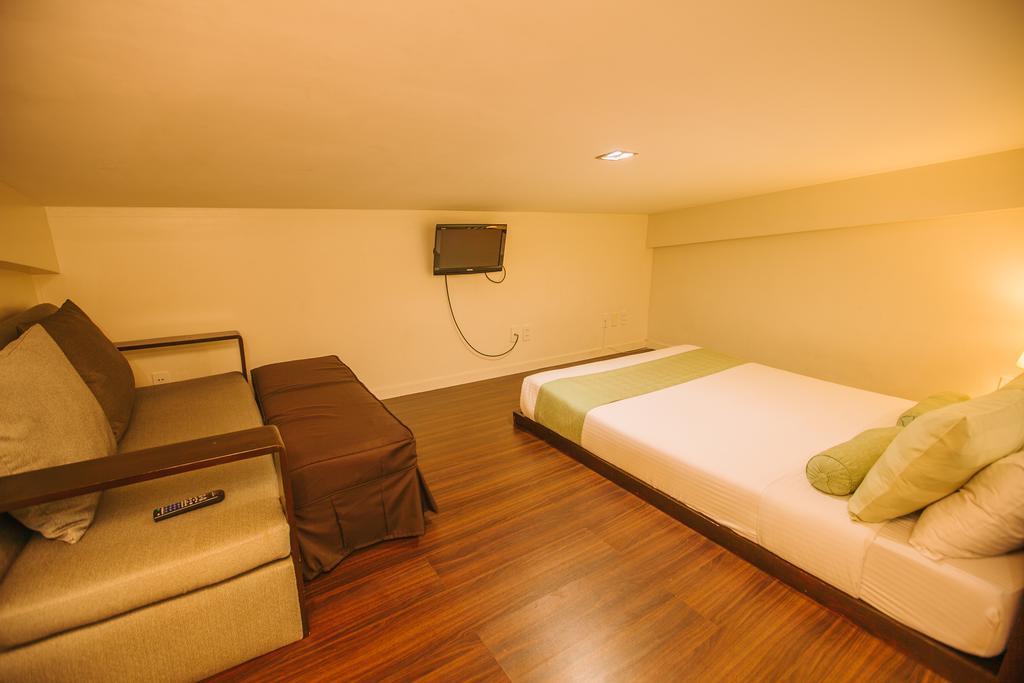 Poco a Poco Hotel Olongapo Quarto foto