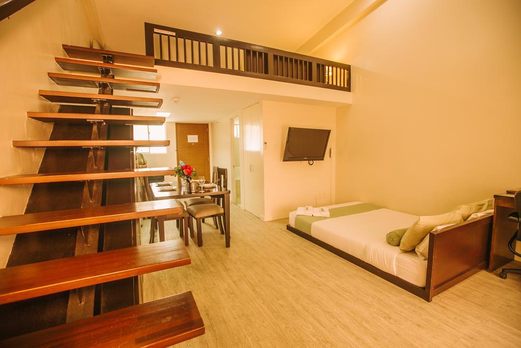 Poco a Poco Hotel Olongapo Quarto foto